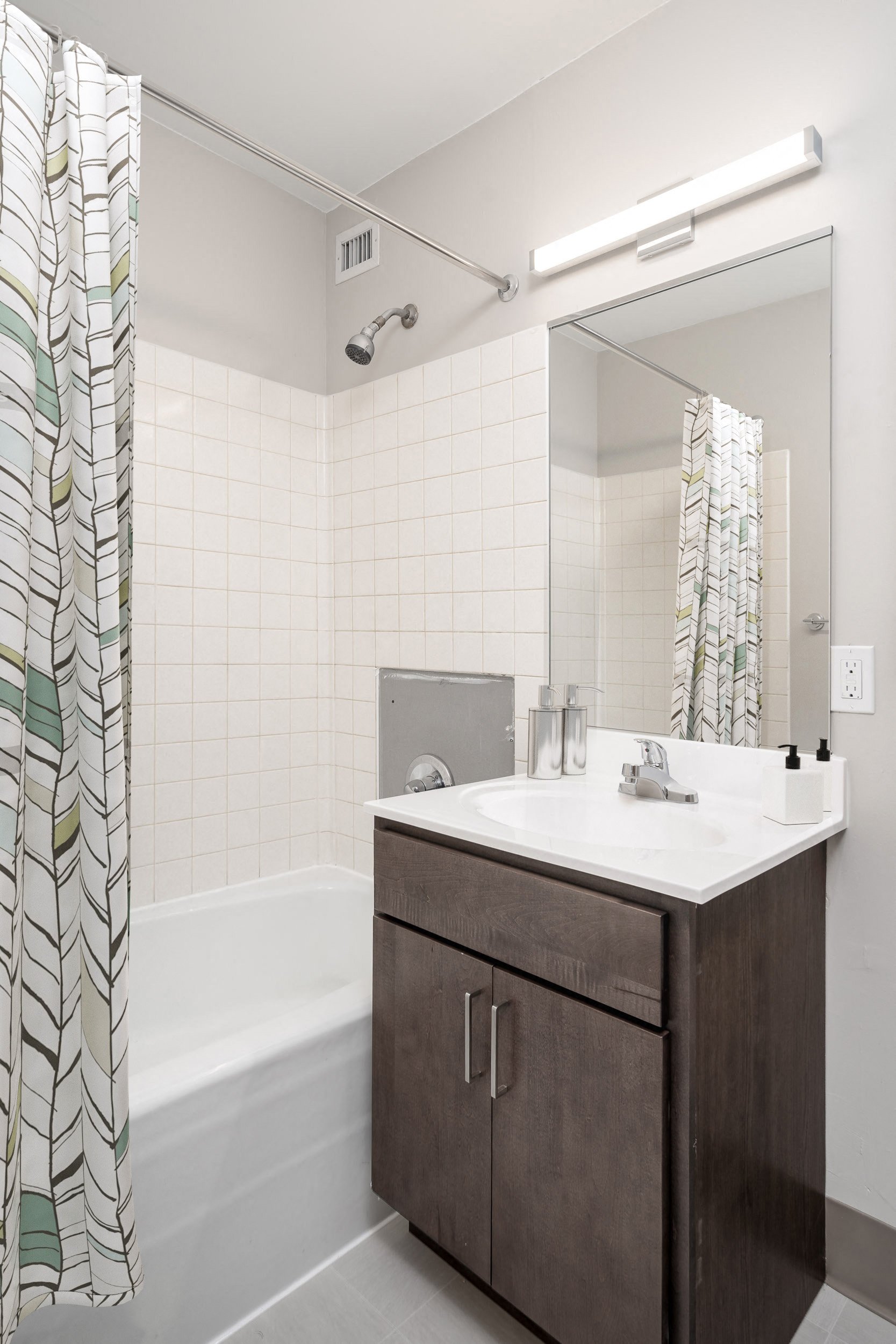 Spacious Showers and Bathroom Vanities